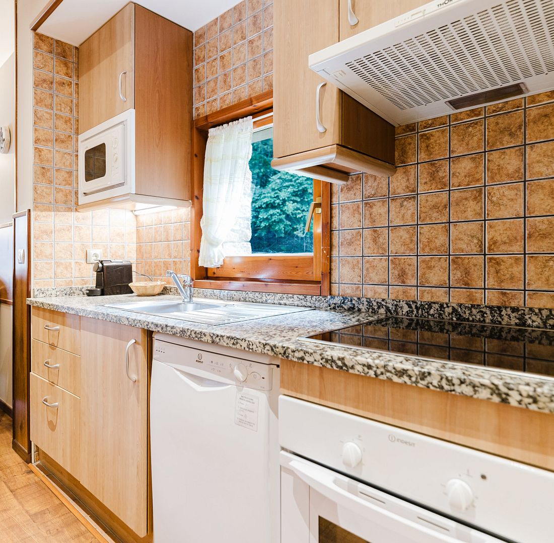 Apartament rústic vistes jardí
